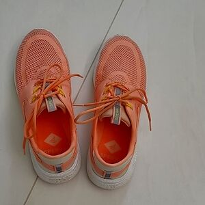 Sperry athletic shoes size 9.5 in peach color. Mesh upper.